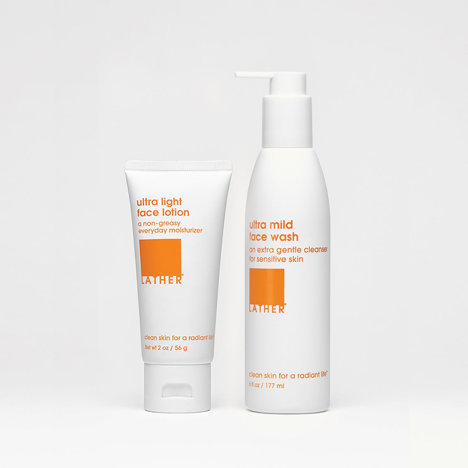 Two white bottles on white background with orange text.