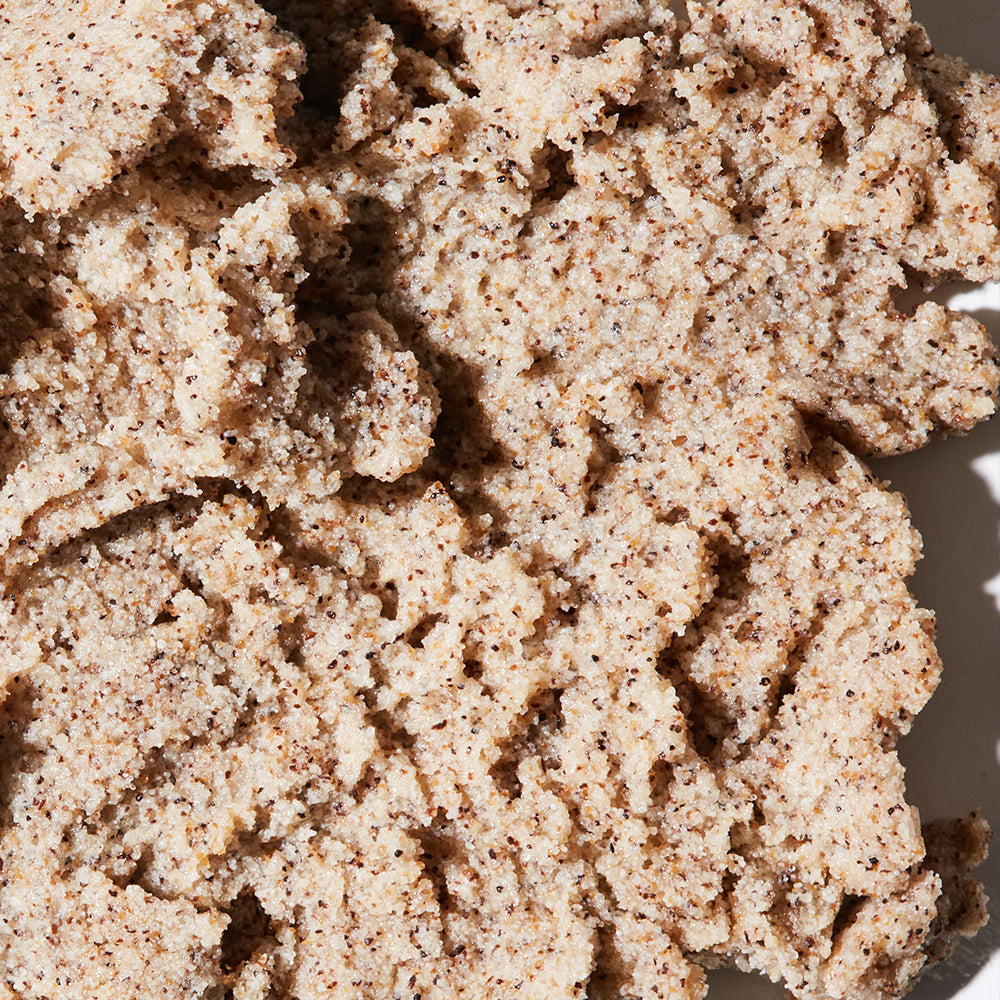 Zoomed in image of the Coconut Foaming Body Scrub to emphasize texture