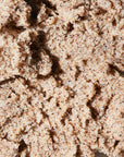 Zoomed in image of the Coconut Foaming Body Scrub to emphasize texture