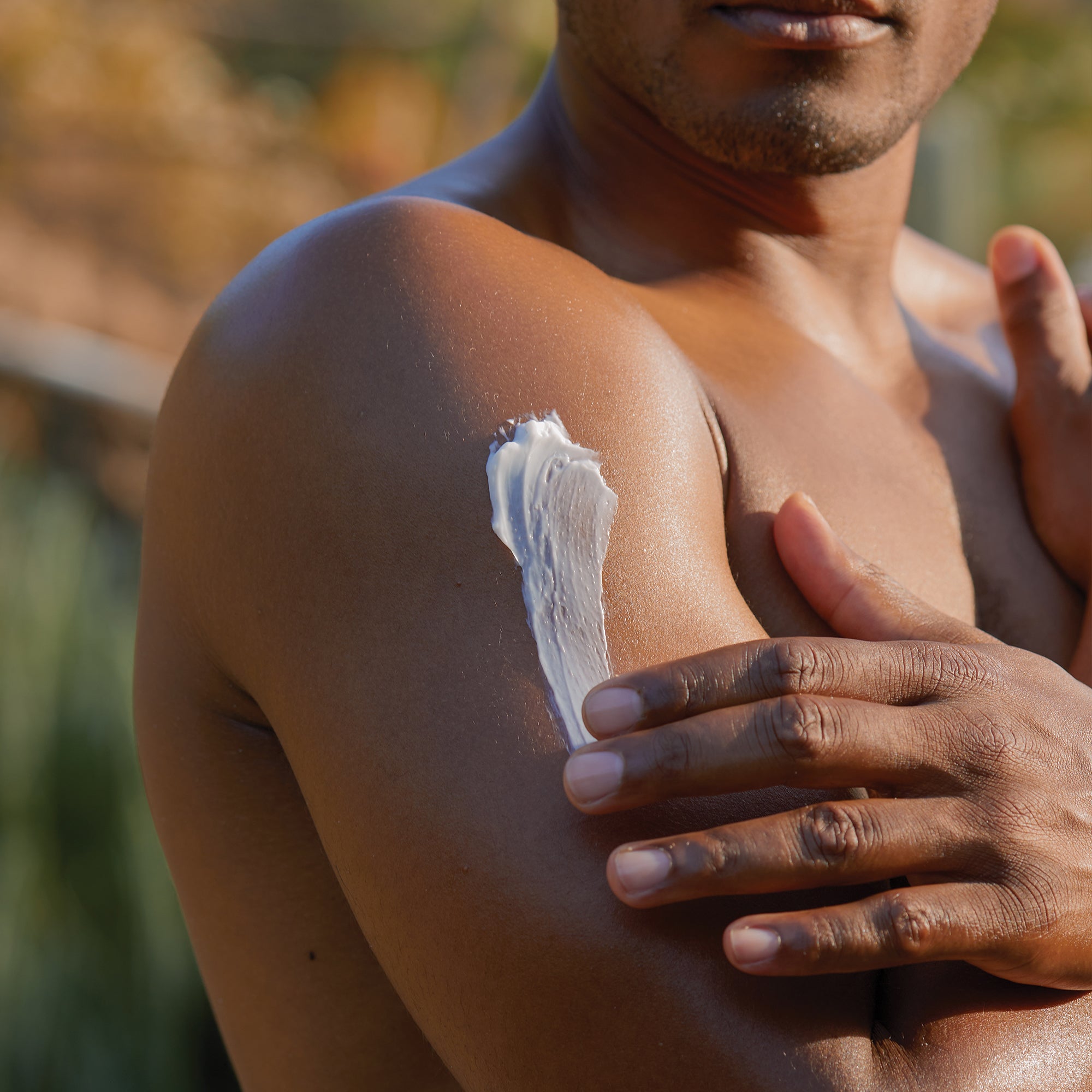 Male model using the Coconut Creme Body Whip